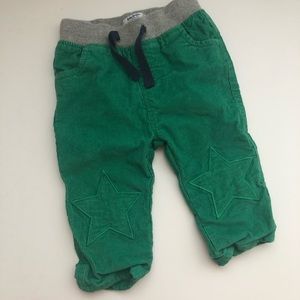 Baby Boden green corduroy pants with star detail